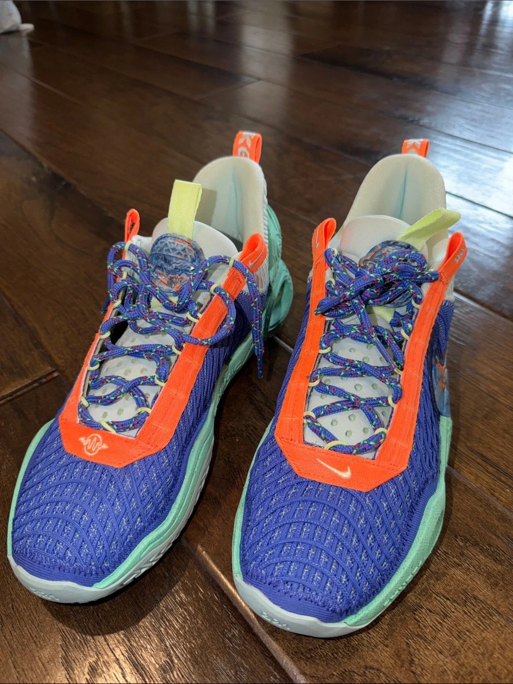 Nike Kids Blue Sneakers with Orange and Mint Accents